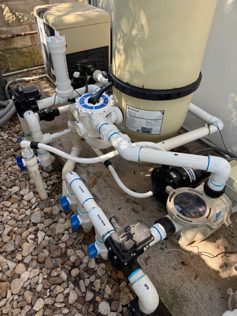 Neptune technician servicing pool filter and equipment pad for a Tampa, FL pool