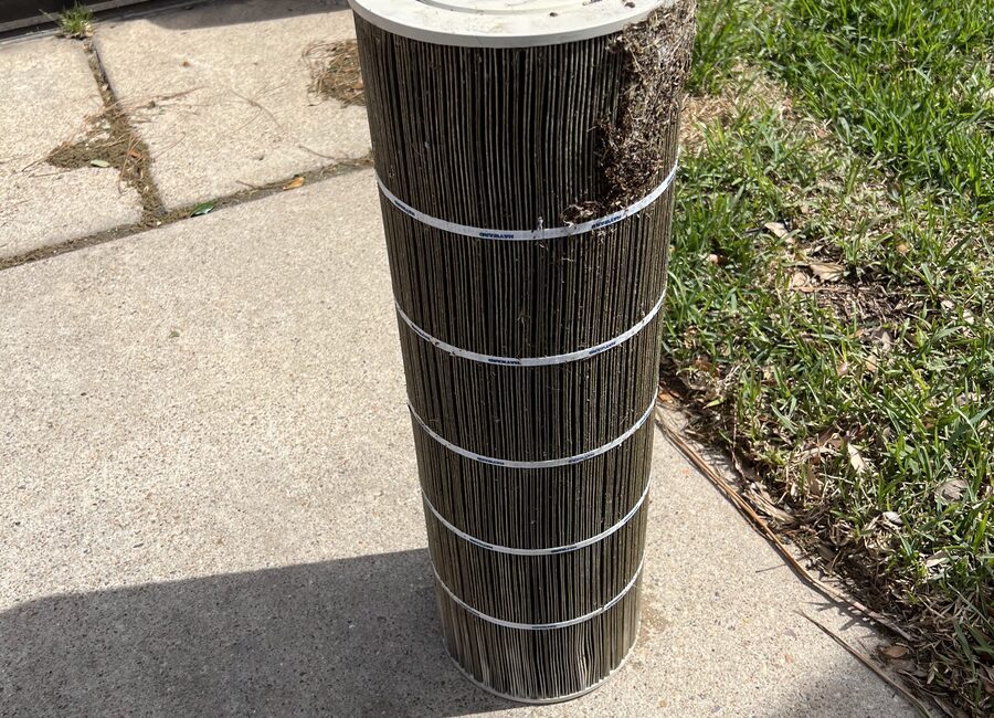 Pool filter being deep-cleaned by Neptune Reliable Pool Service in Tampa