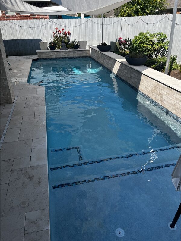 Crystal clear pool maintained by Neptune Reliable Pool Service in Tampa